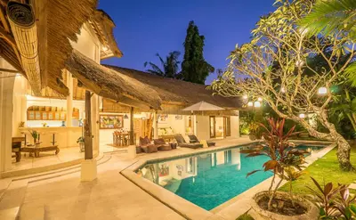 an image of a house with a swimming pool at Villa Umah Maya in Seminyak