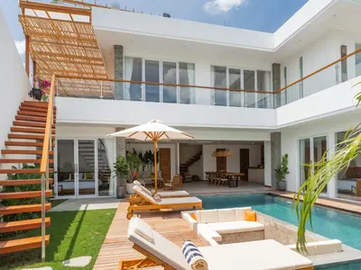 a villa with a swimming pool and a house at Lux 500sqm 5BR Villa, 400m to FINNS & Canggu Beach in Canggu