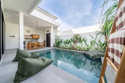 an indoor swimming pool in a house at Peaceful 2BR Pool Villa in Kerobokan - V2 in Kerobokan