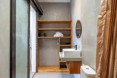 a bathroom with a sink and a mirror at Peaceful 2BR Pool Villa in Kerobokan - V1 in Kerobokan