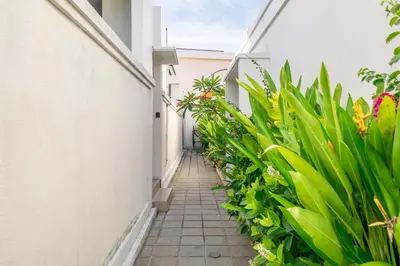 an alleyway in a building with green plants at Peaceful 2BR Pool Villa in Kerobokan - V1 in Kerobokan