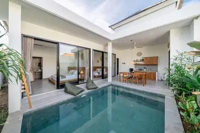 a swimming pool in a villa with a bedroom at Peaceful 2BR Pool Villa in Kerobokan - V1 in Kerobokan