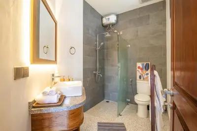 a bathroom with a sink and a shower at 4 Bd Seminyak Scenic Rice Views 4 mins to Beach in Seminyak
