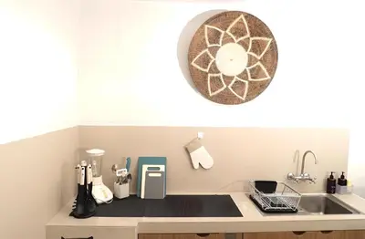 a kitchen with a sink and a counter top at Villa Mimoza Umalas Bali in Kerobokan