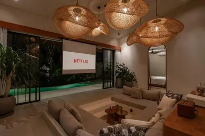 a living room with a couch and a tv at New SASS Villa - Stylish & Modern 3BR at Seminyak in Seminyak