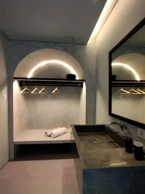 a bathroom with a sink and a mirror at Hanupis Canggu Apartment in Canggu
