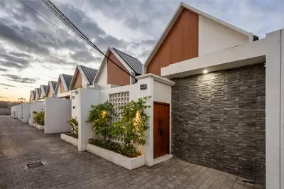 a row of houses on a street at Modern and Petite 2bd Seminyak Villa Construction Near in Seminyak