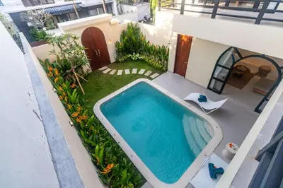 an overhead view of a swimming pool on a building at Villa Amaia Bali in Kerobokan