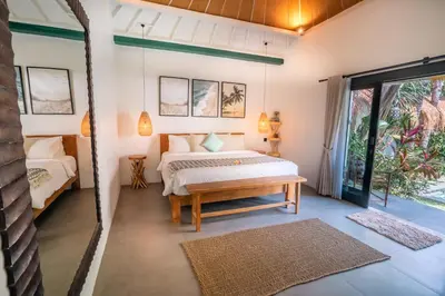 a bedroom with a bed and a window at Villa Mint, 3Br Tropical Escape, Near Bintang Supermarket in Seminyak