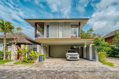 a car parked in front of a house at Natadesa Villa 3BR Family Villa in Jimbaran in Jimbaran