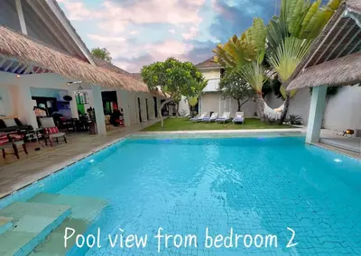 a pool view from bedroom of a villa at Villa Anh Yeu - 6 BR in Central Seminyak with Huge Pool & Garden in Seminyak