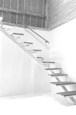 a set of stairs in a white room at PROMO Private Vacation Rental Villa 2 Pools 4 Bedrooms 4 Bathroom Free Airport Pickup in Denpasar