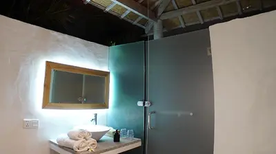 a bathroom with a sink and a shower at PROMO Private Vacation Rental Villa 2 Pools 4 Bedrooms 4 Bathroom Free Airport Pickup in Denpasar