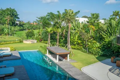 a view of the pool and the backyard of a villa at Dreamtime House Bali in Canggu
