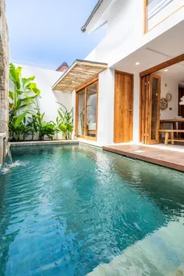 an image of a swimming pool in a villa at Villa Monstera A7 By Aishwarya International in Kerobokan