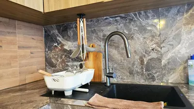 a bathroom with a sink and a sink at MauLagi Bali Getaway in Jimbaran