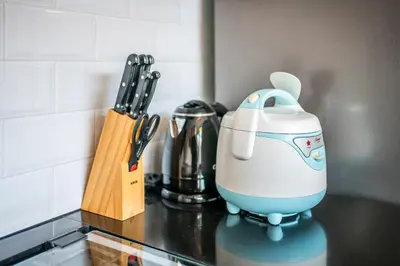 a blue and white mixer sitting on top of a counter at Villa Lotus by Unicorn Villas Bali in Kerobokan