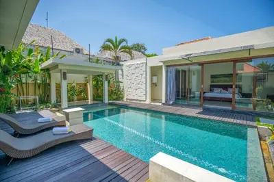 a villa with a swimming pool and a house at 1BR Private Pool Villa in Seminyak PB in Seminyak