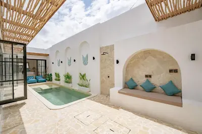 a villa with a pool in the middle of a room at Soft Opening! Villa Lumière 1 Seminyak in Seminyak