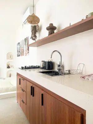 a kitchen with a sink and a counter top at Cozy and Chic Villa with Private Pool at Balangan in Jimbaran