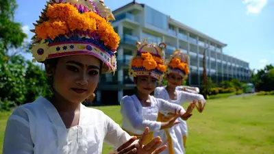a group of girls wearing hats on their heads at The Sintesa Jimbaran Bali in Jimbaran