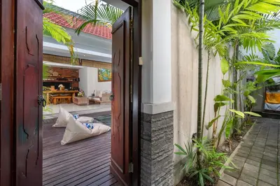 an open door of a house with a patio at Honeymoon Villa Aisha in The Heart of Legian in Seminyak