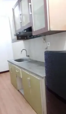 a kitchen with a sink and a counter top at Dewata ayu resident in Seminyak