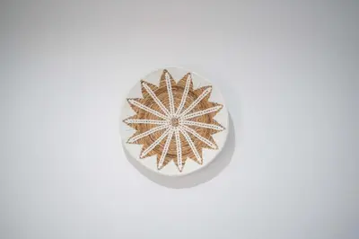 a white bowl with a gold star pattern on it at Town House, Modern Minimalis, Lokasi Strategis in Seminyak