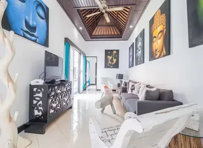 a living room with white walls and a ceiling at Villa Marjens 2 Seminyak area Bali in Kerobokan