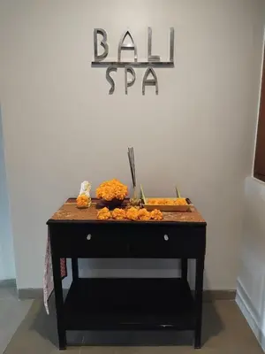 a table with a buffet of food on top of it at Cozy Apartement in Seminyak in Uluwatu