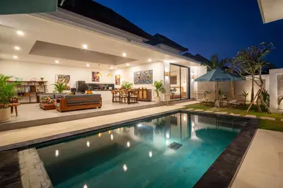 a swimming pool in the backyard of a house at Villa Vela 1 - Brand new 3 bedroom villa in Seminyak