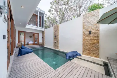 a swimming pool in the backyard of a house at 3BR Pool Villa in Berawa - Walk to Beach & Cafes in Canggu