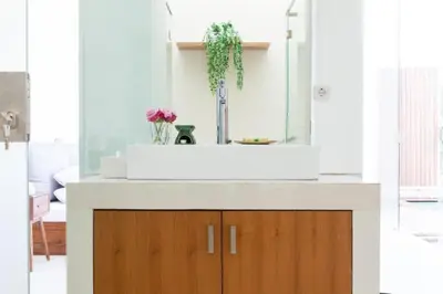 a bathroom with a sink and a mirror at Modern Tropical 2BR Villa in Seminyak Kuta with Pool & Garden in Legian