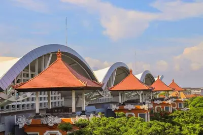 a building with orange roofs in front at RBE Hotel Kuta 3- 5 Min to Airport&Beach by Micky Studio in Ngurah Rai International Airport