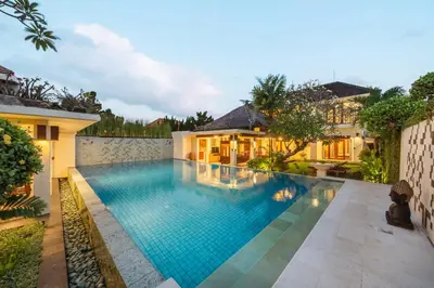 a swimming pool in the backyard of a house at The Cemara Umalas in Kerobokan