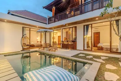 an indoor swimming pool in a house at Villa O'Anne 3 in Seminyak