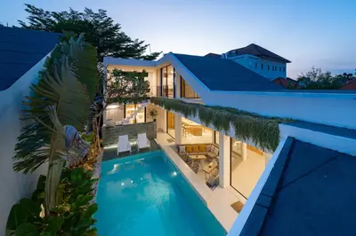 an aerial view of a house with a swimming pool at Kona Resort - Seminyak in Kerobokan