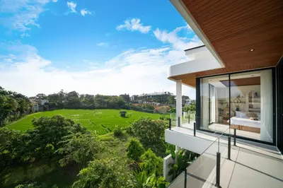 a house with a view of a green field at New Luxury villa walk to Atlas, Finns and Berawa beach in Canggu
