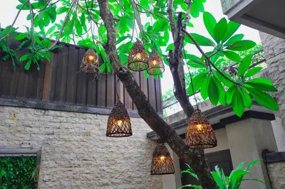 a group of lights hanging from a tree at Luxury Villa 3br 5min to Seminyak beach in Seminyak