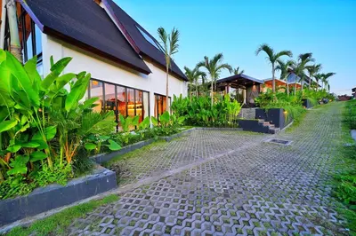 a cobblestone street in front of a building at New! Architectural 2BR Villa near Seminyak in Kerobokan