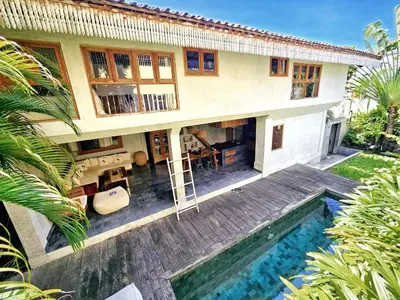 an aerial view of a house with a swimming pool at Villa Hibou - New Tropical Luxury 2BR near Canggu in Canggu