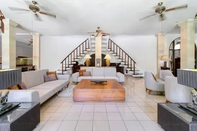 a living room with couches and a table at 3BR Seminyak Oasis, Sleeps 6, Walk to RestBars in Seminyak