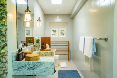 a bathroom with a sink and a mirror at Anam Khaya - Brand New Villa, Walk to Seminyak Beach in Seminyak