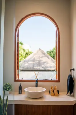 a bathroom with a sink and a window at New Luxury 3BR Villa walk to Atlas, Finns & Berawa beach in Canggu