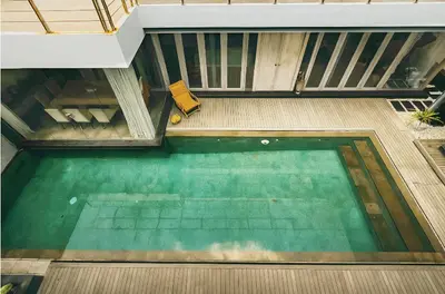 an overhead view of a swimming pool in a house at Villa Avrora Batubelig in Canggu