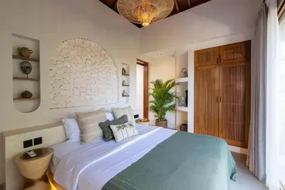 a bedroom with a large bed and a large window at 2BR Modern Mediterranean Villa Near Nook in Badung