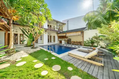 an image of a villa with a swimming pool at Tuluscoliving Villa Legian 4 Bedrooms and 4 Bathroom in Legian