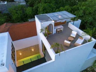 an aerial view of a house with a patio at Leva Villa - Luxury 3BR Jimbaran in Jimbaran