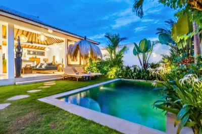 a swimming pool in the backyard of a villa at Avery 1 BR Private Pool Villa in Seminyak
