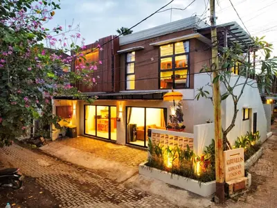 a house in the middle of a street at Seminyak Apartment 37 in Seminyak